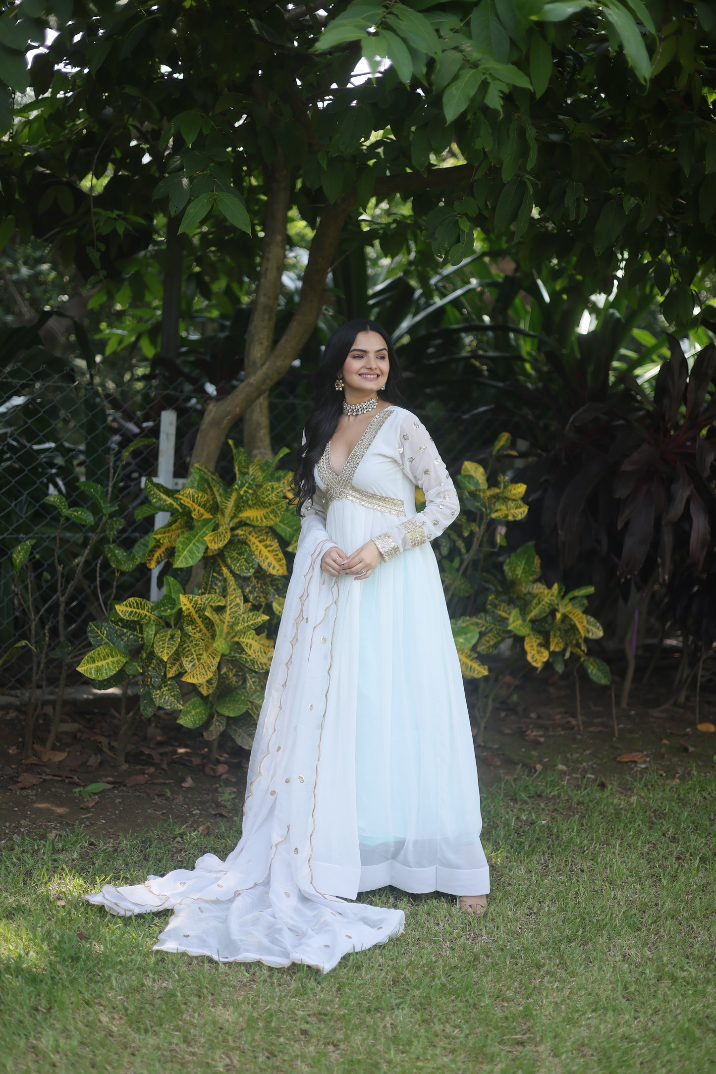 WHITE FAUX BLOOMING WITH EMBROIDERY ZARI SEQUINS-WORK GOWN