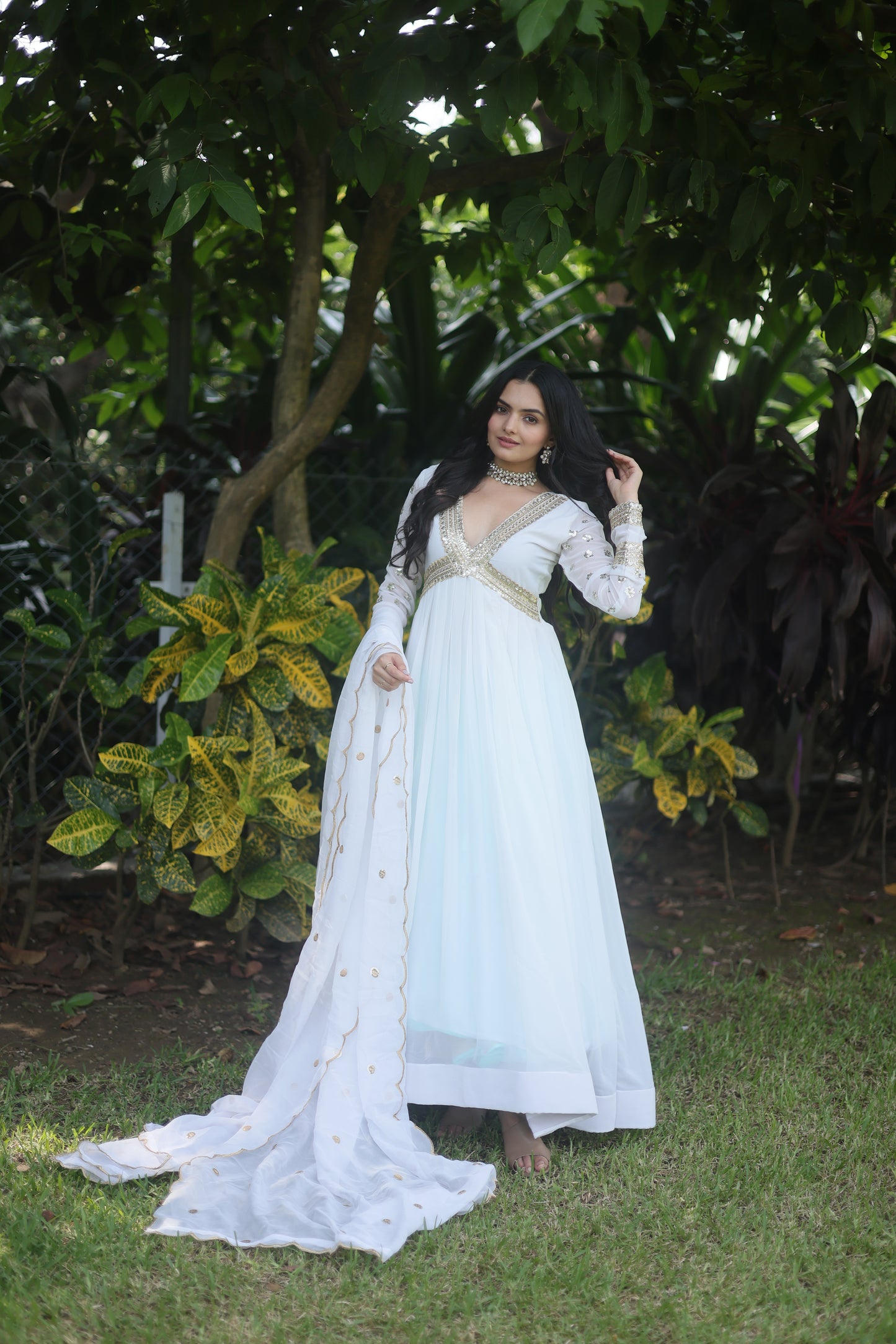 WHITE FAUX BLOOMING WITH EMBROIDERY ZARI SEQUINS-WORK GOWN